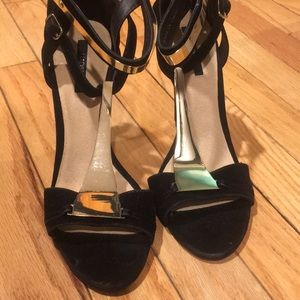 Black shade heels with gold detailing